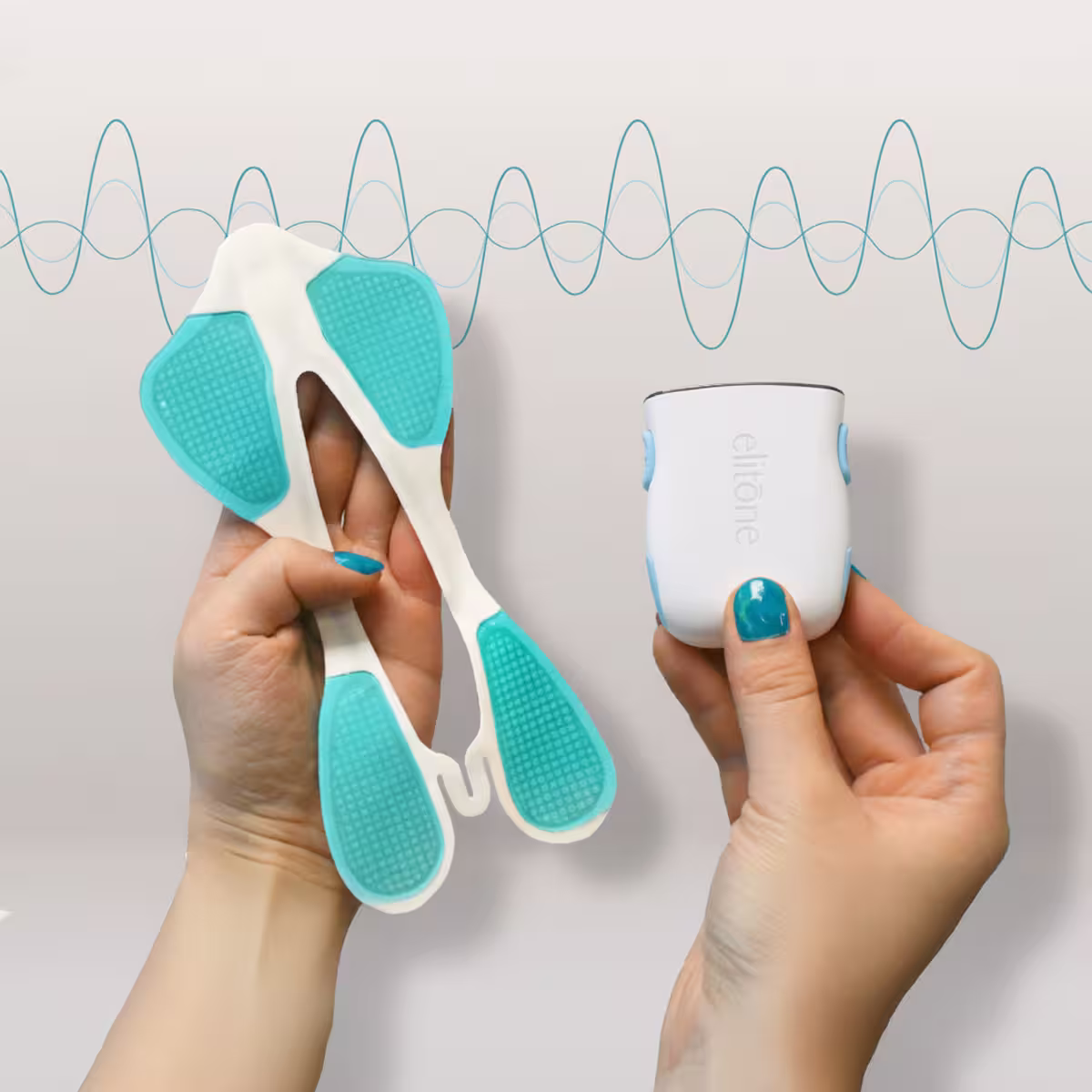 Elitone and GelPad being held with wavelength in background